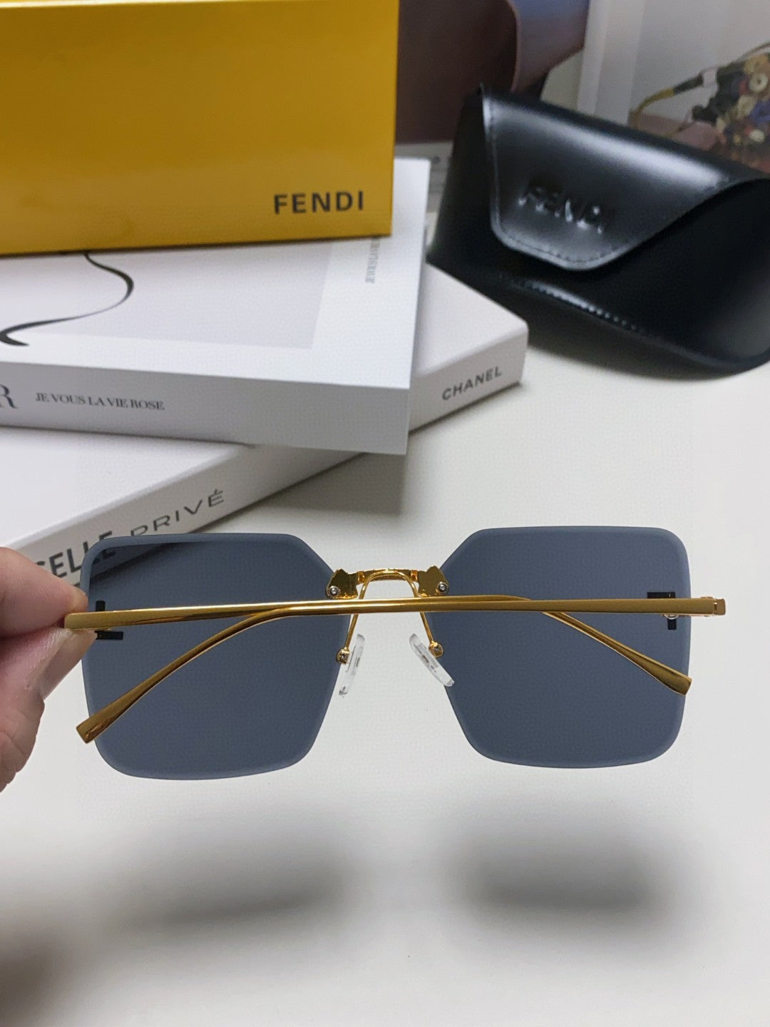 Fendi FE4082US Lightweight Metal Rimless Gray Lens Sunglasses for Men & Women - detail image 6