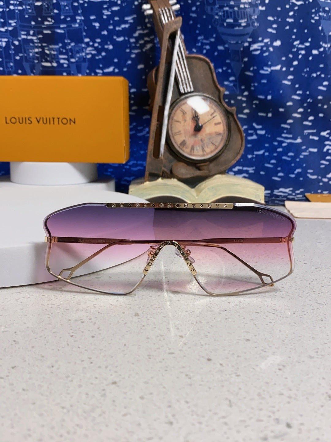 Louis Vuitton Lightweight Rimless Purple Lens Sunglasses for Men & Women - detail image 9