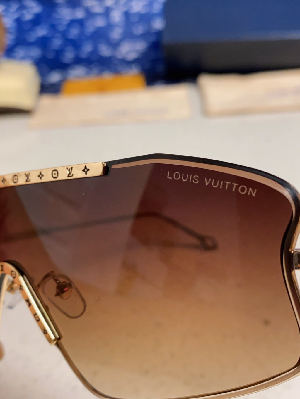 Louis Vuitton Lightweight Rimless Red Lens Sunglasses for Men & Women - detail image 7