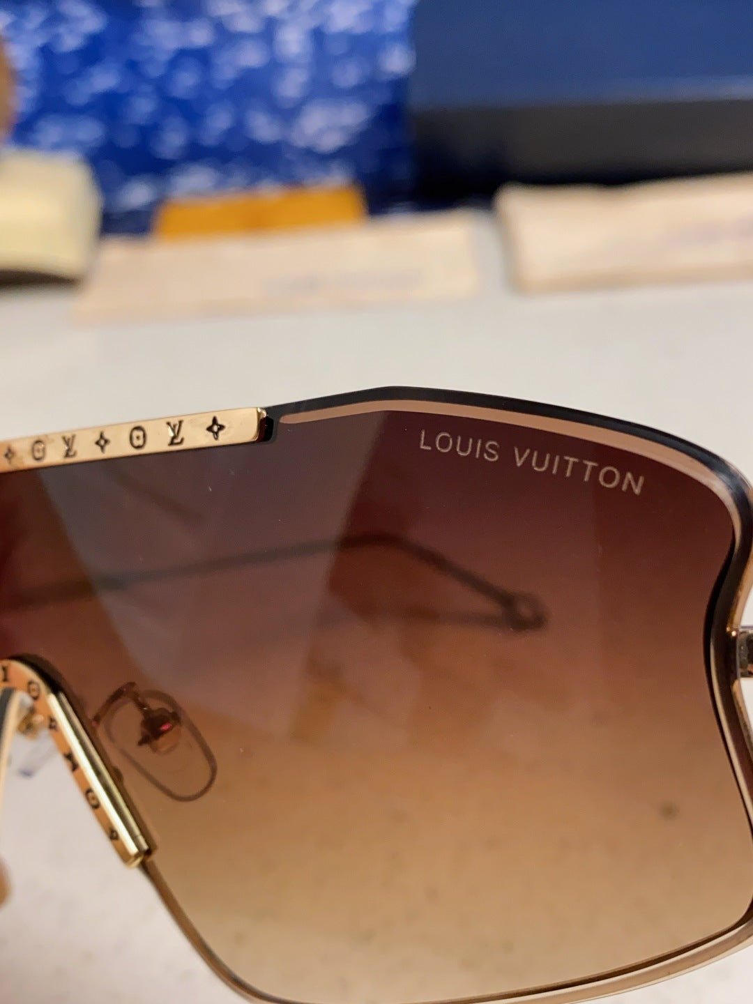 Louis Vuitton Lightweight Rimless Red Lens Sunglasses for Men & Women - detail image 7
