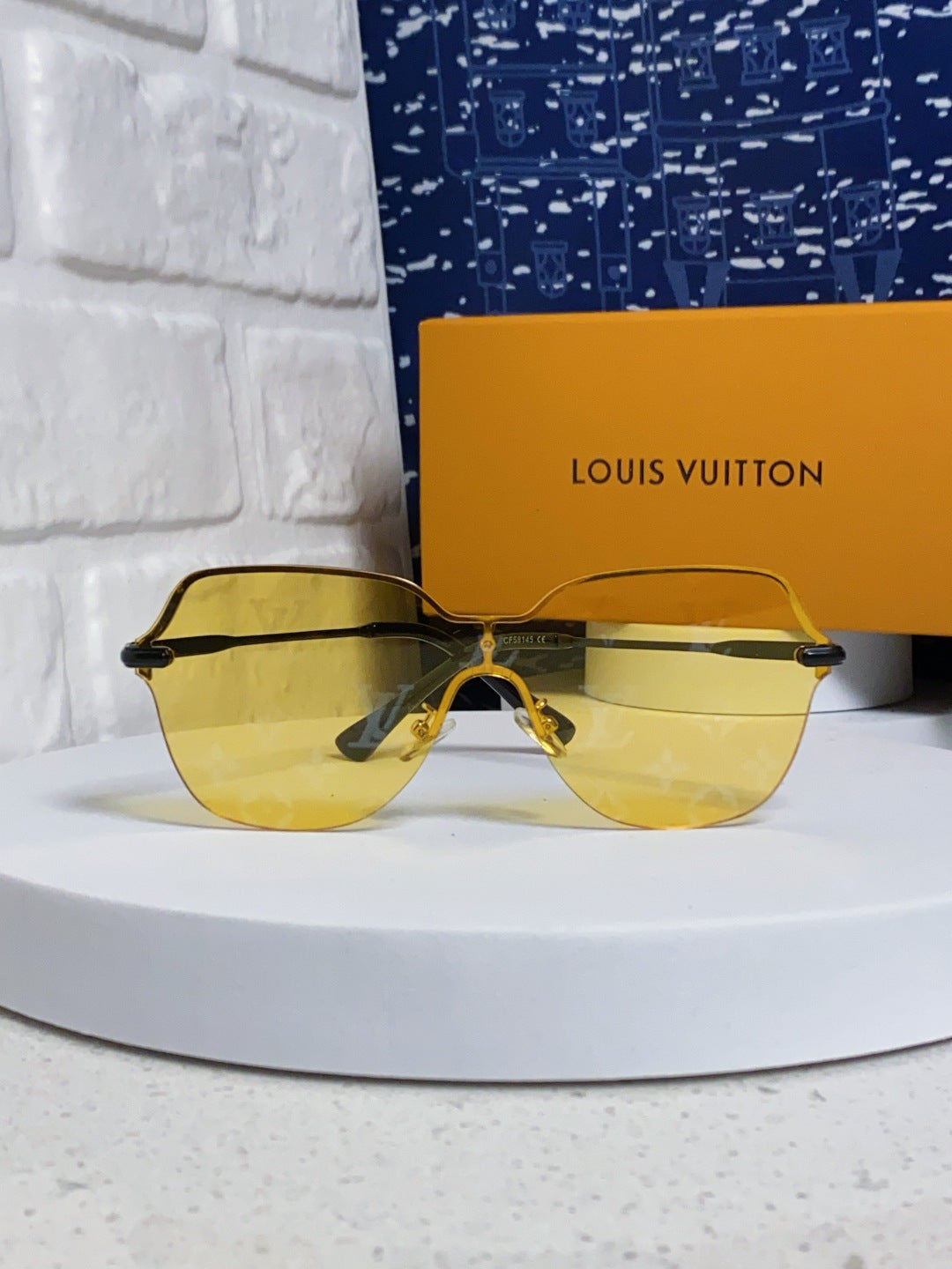 Louis Vuitton Lightweight Rimless Orange Lens Sunglasses for Women - detail image 2