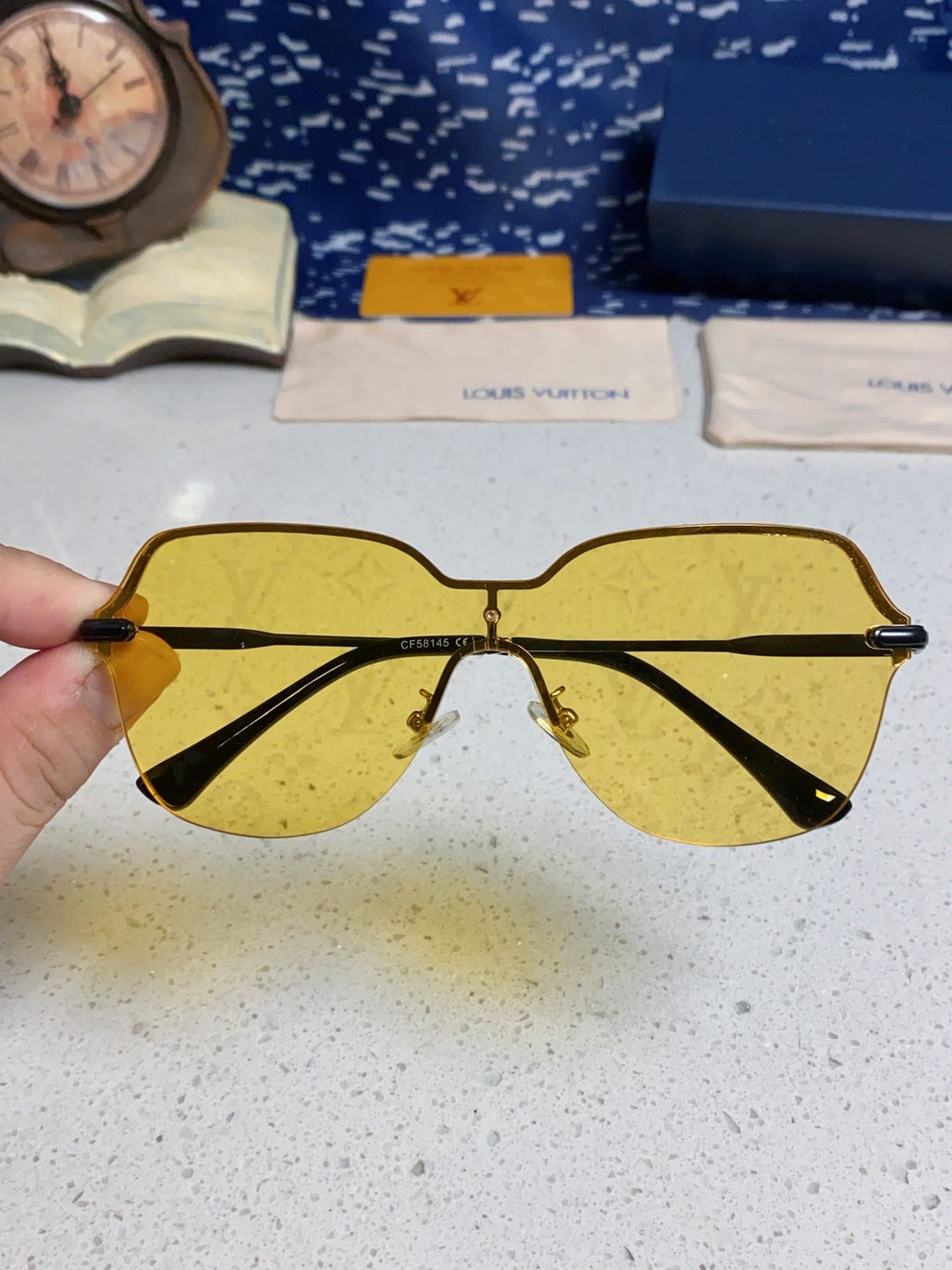 Louis Vuitton Lightweight Rimless Orange Lens Sunglasses for Women - detail image 4