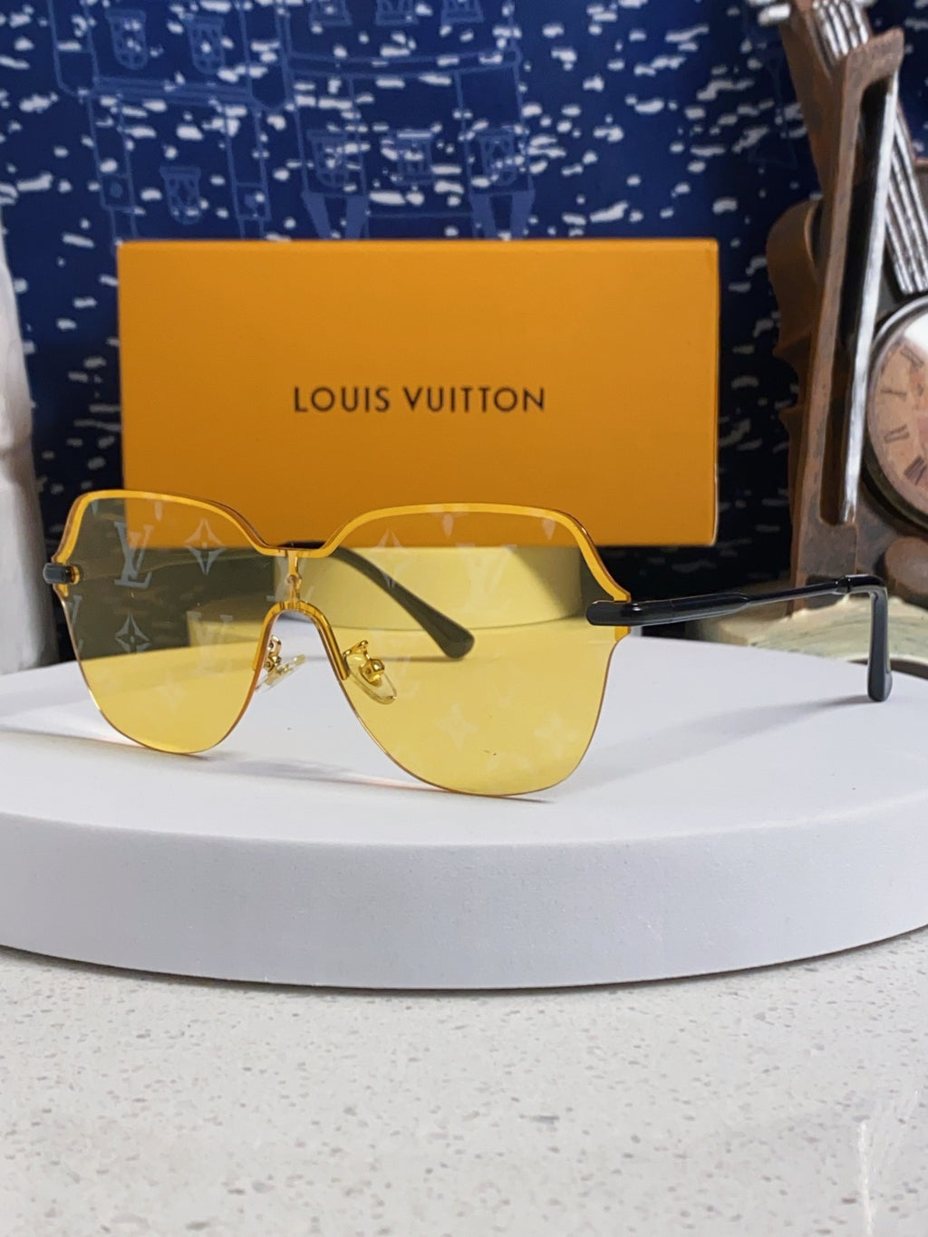 Louis Vuitton Lightweight Rimless Orange Lens Sunglasses for Women
