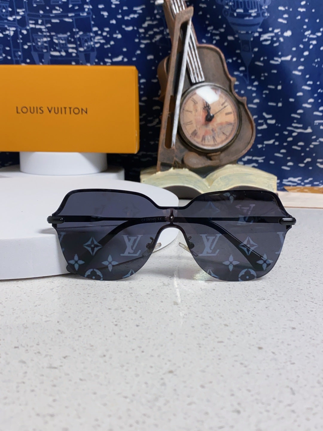 Louis Vuitton Lightweight Rimless Blue Lens Sunglasses for Women - detail image 7