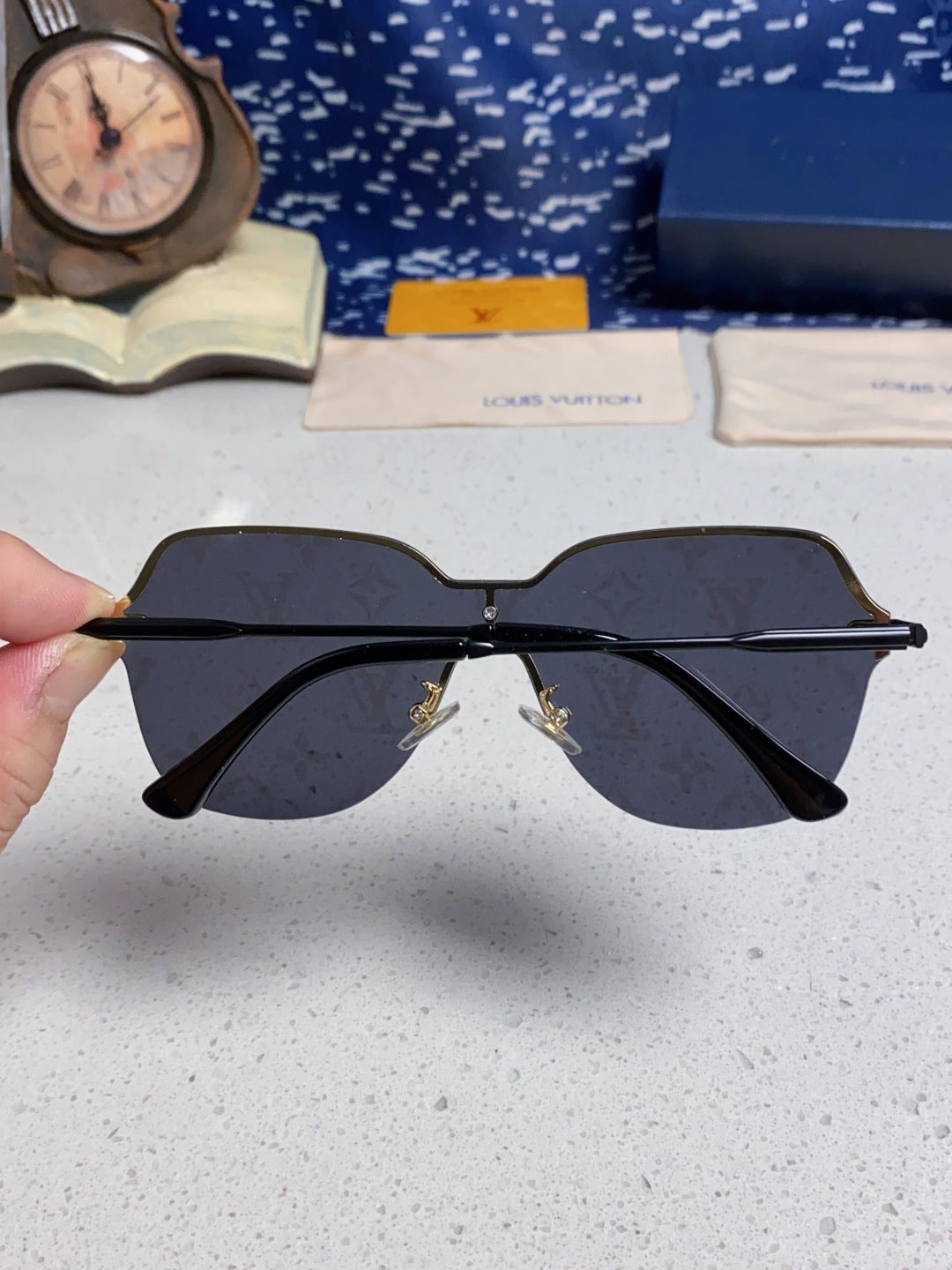 Louis Vuitton Lightweight Rimless Blue Lens Sunglasses for Women - detail image 5
