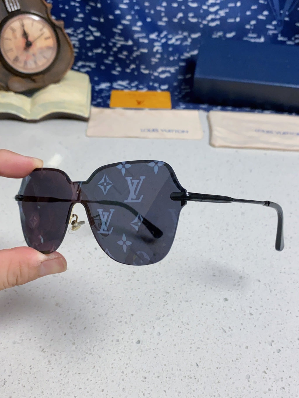 Louis Vuitton Lightweight Rimless Blue Lens Sunglasses for Women - detail image 6