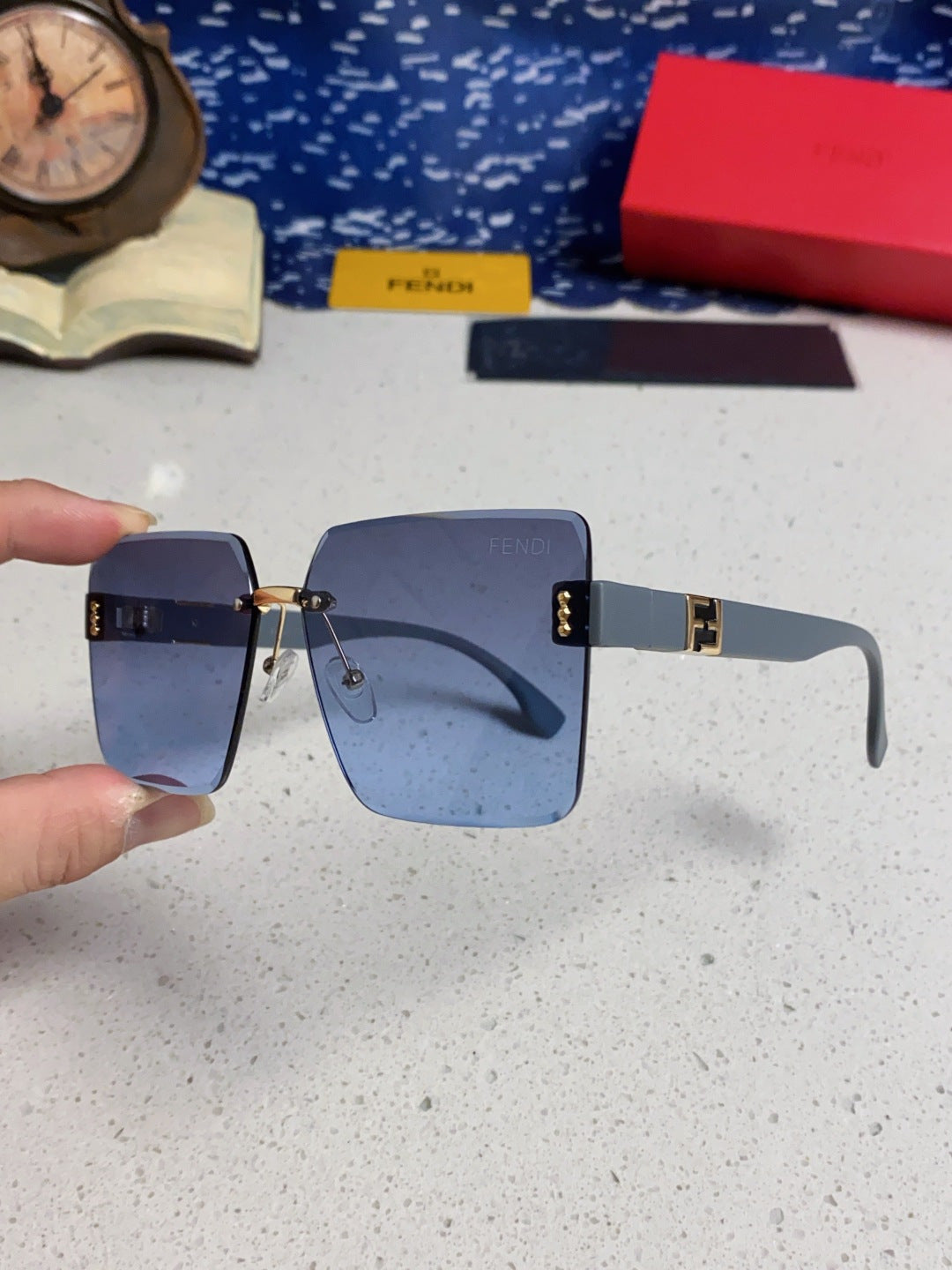 Fendi Lightweight Rimless Blue Lens Sunglasses for Women - detail image 6