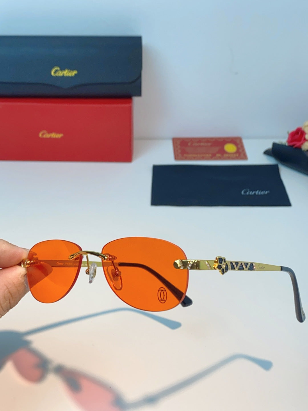 Cartier Lightweight Rimless Orange Lens Sunglasses for Men & Women - detail image 6