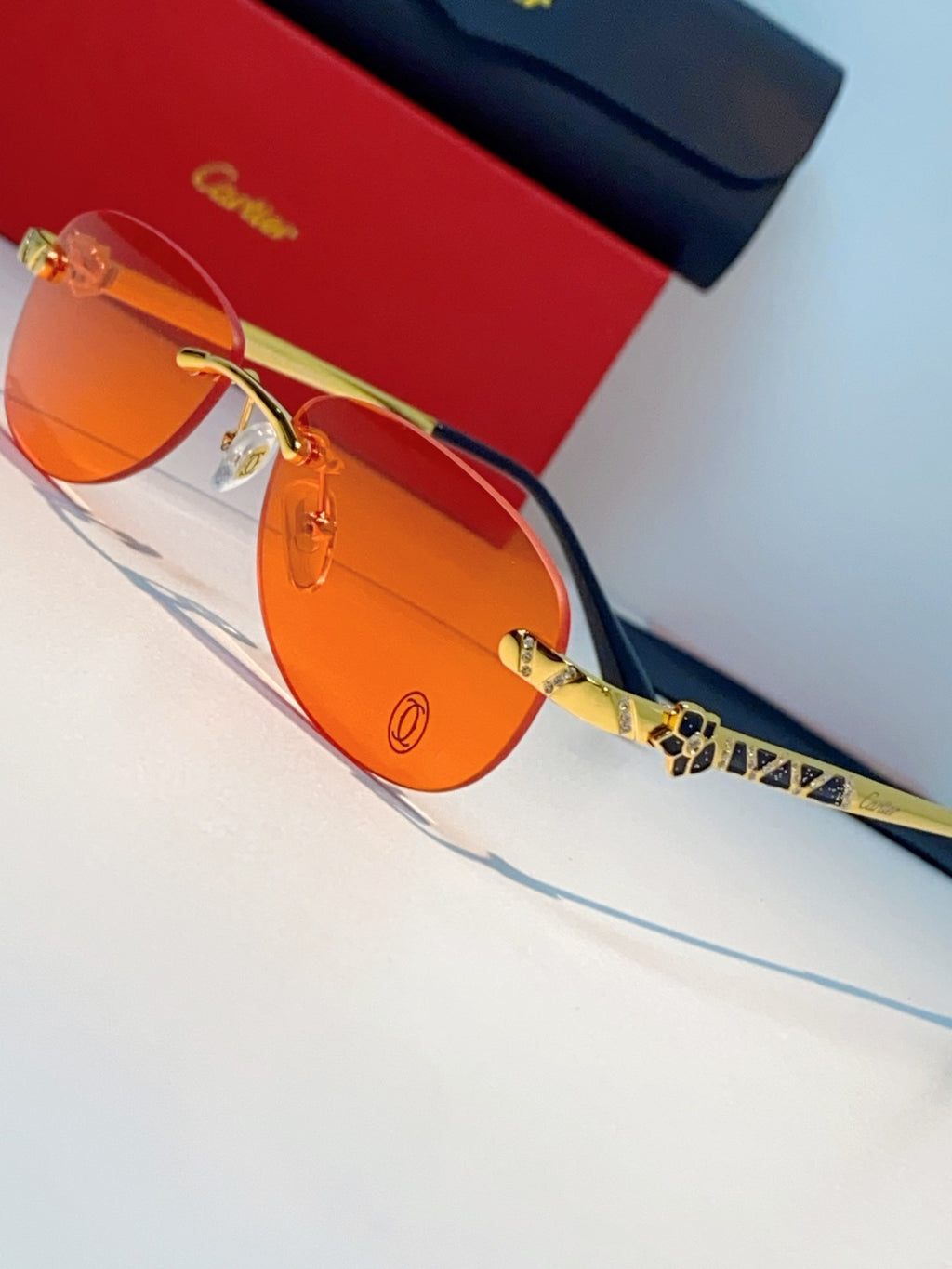 Cartier Lightweight Rimless Orange Lens Sunglasses for Men & Women - detail image 7