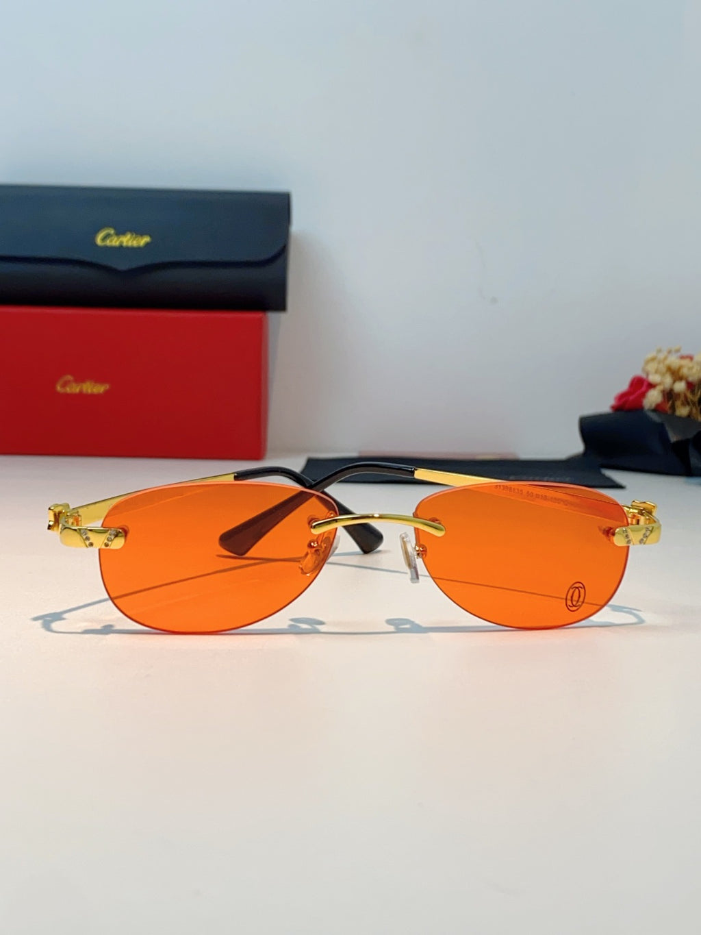 Cartier Lightweight Rimless Orange Lens Sunglasses for Men & Women - detail image 2