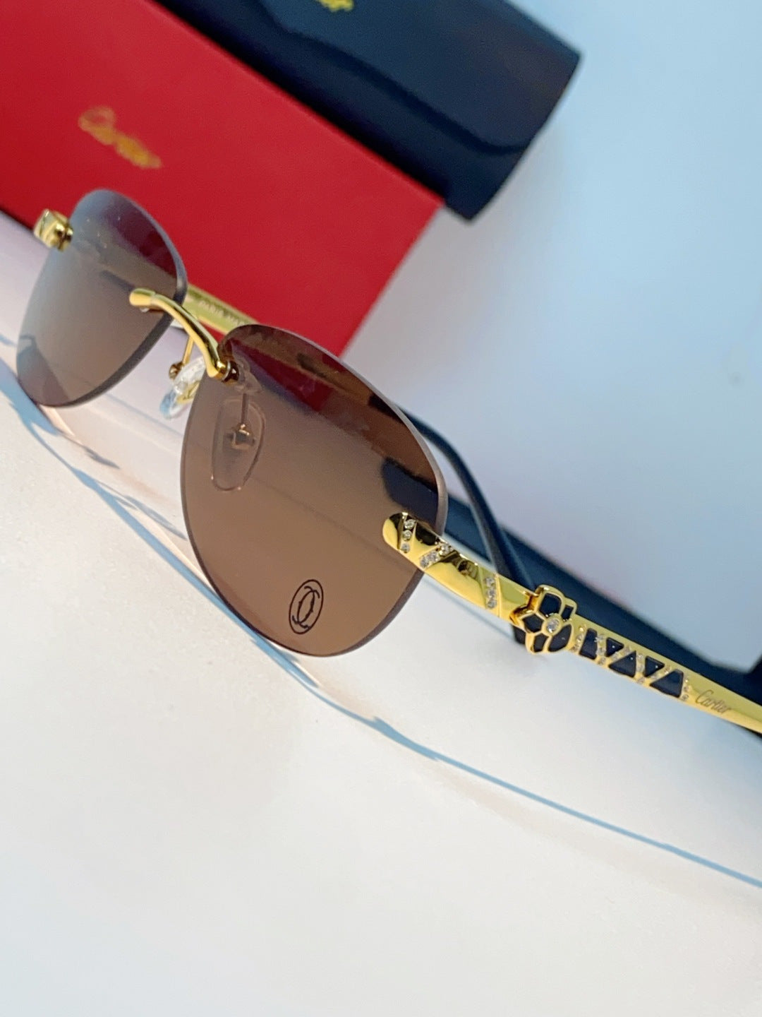 Cartier Lightweight Rimless Brown Lens Sunglasses for Men & Women - detail image 7