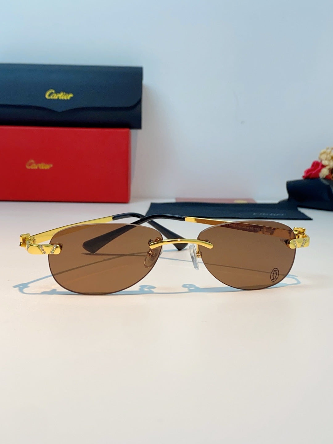 Cartier Lightweight Rimless Brown Lens Sunglasses for Men & Women - detail image 2