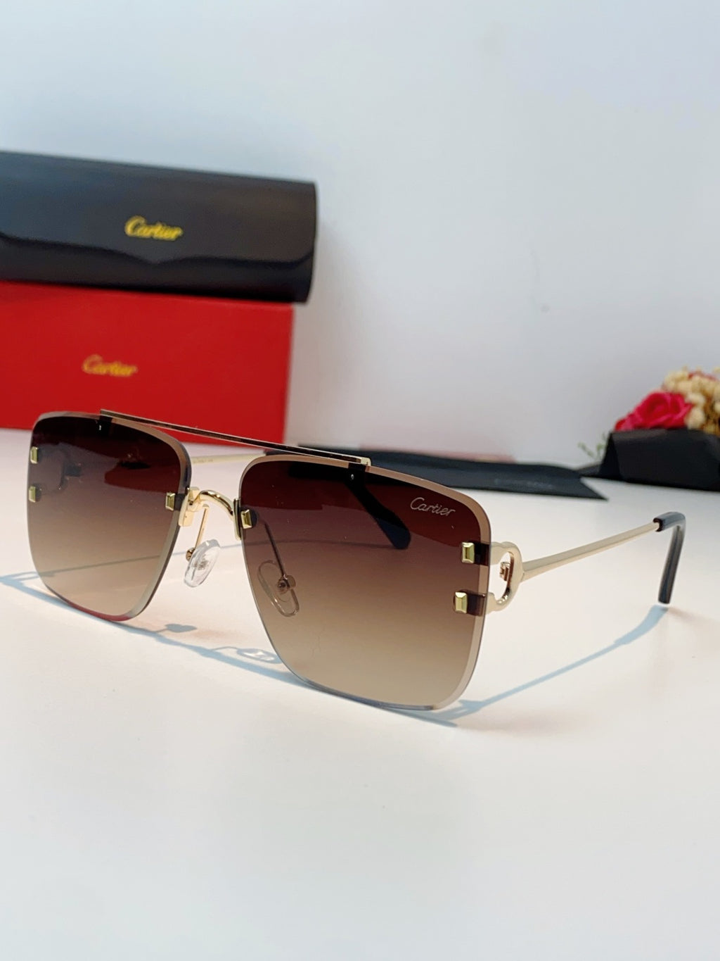 Cartier Lightweight Metal Rimless Red Lens Sunglasses for Men & Women - 487221