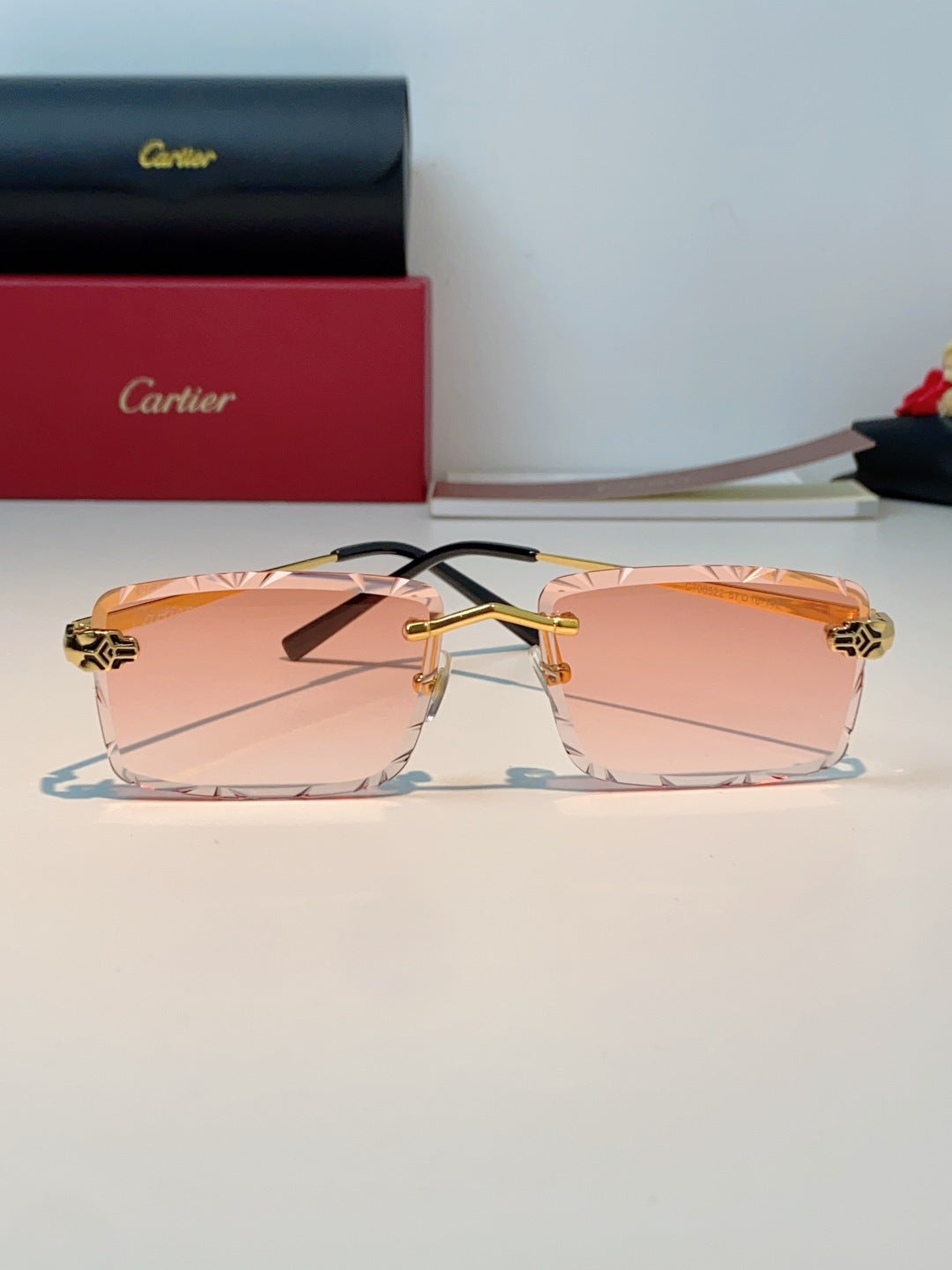 Cartier Lightweight Rimless Pink Lens Sunglasses for Men & Women - detail image 2