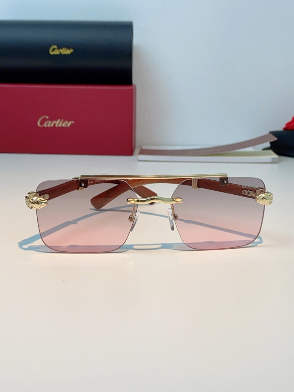 Cartier Lightweight Rimless Red Lens Sunglasses for Men & Women - detail image 2