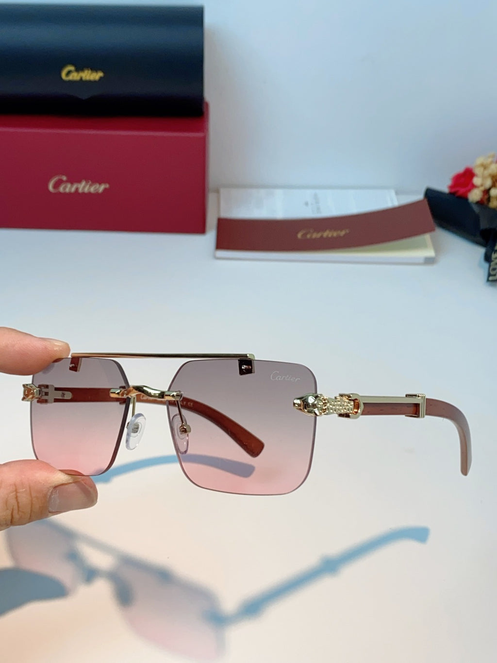 Cartier Lightweight Rimless Red Lens Sunglasses for Men & Women - detail image 6