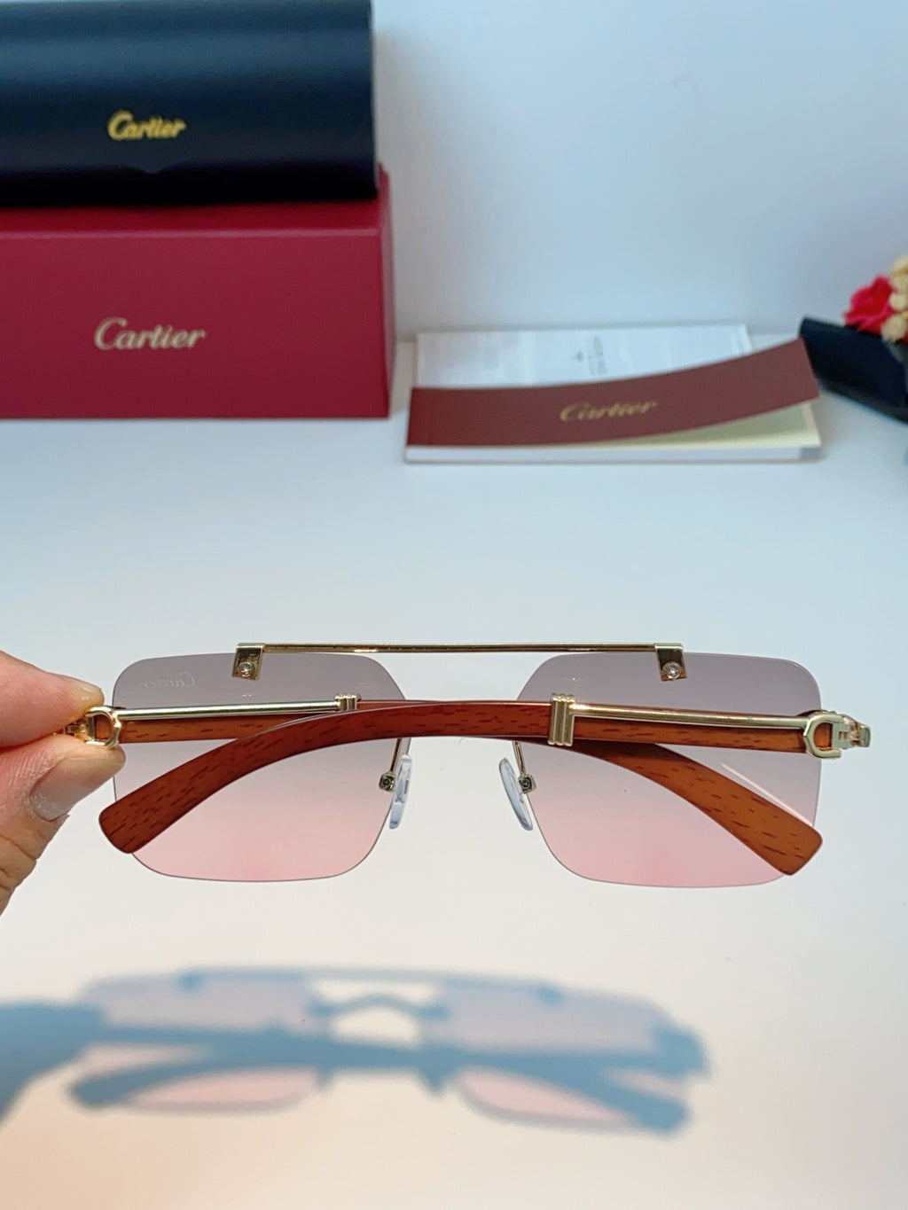 Cartier Lightweight Rimless Red Lens Sunglasses for Men & Women - detail image 5
