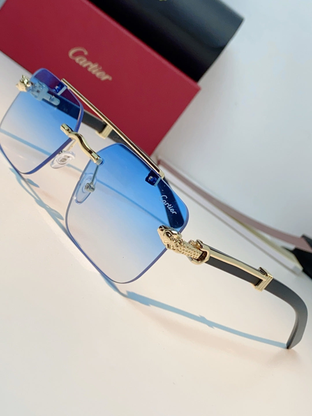 Cartier Lightweight Rimless Blue Lens Sunglasses for Men & Women - 487315 - detail image 7