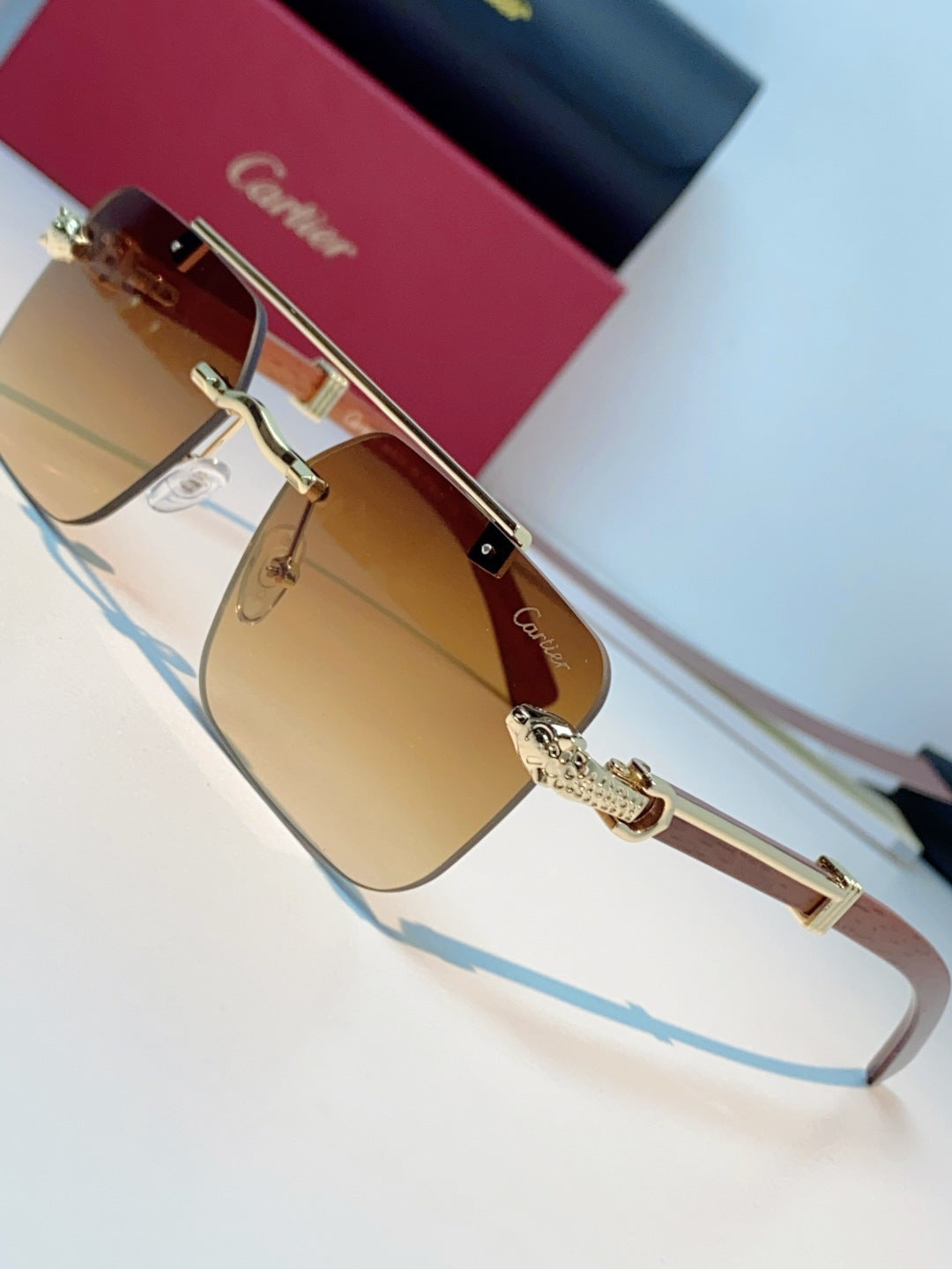 Cartier Lightweight Rimless Orange Lens Sunglasses for Men & Women - 487316 - detail image 7