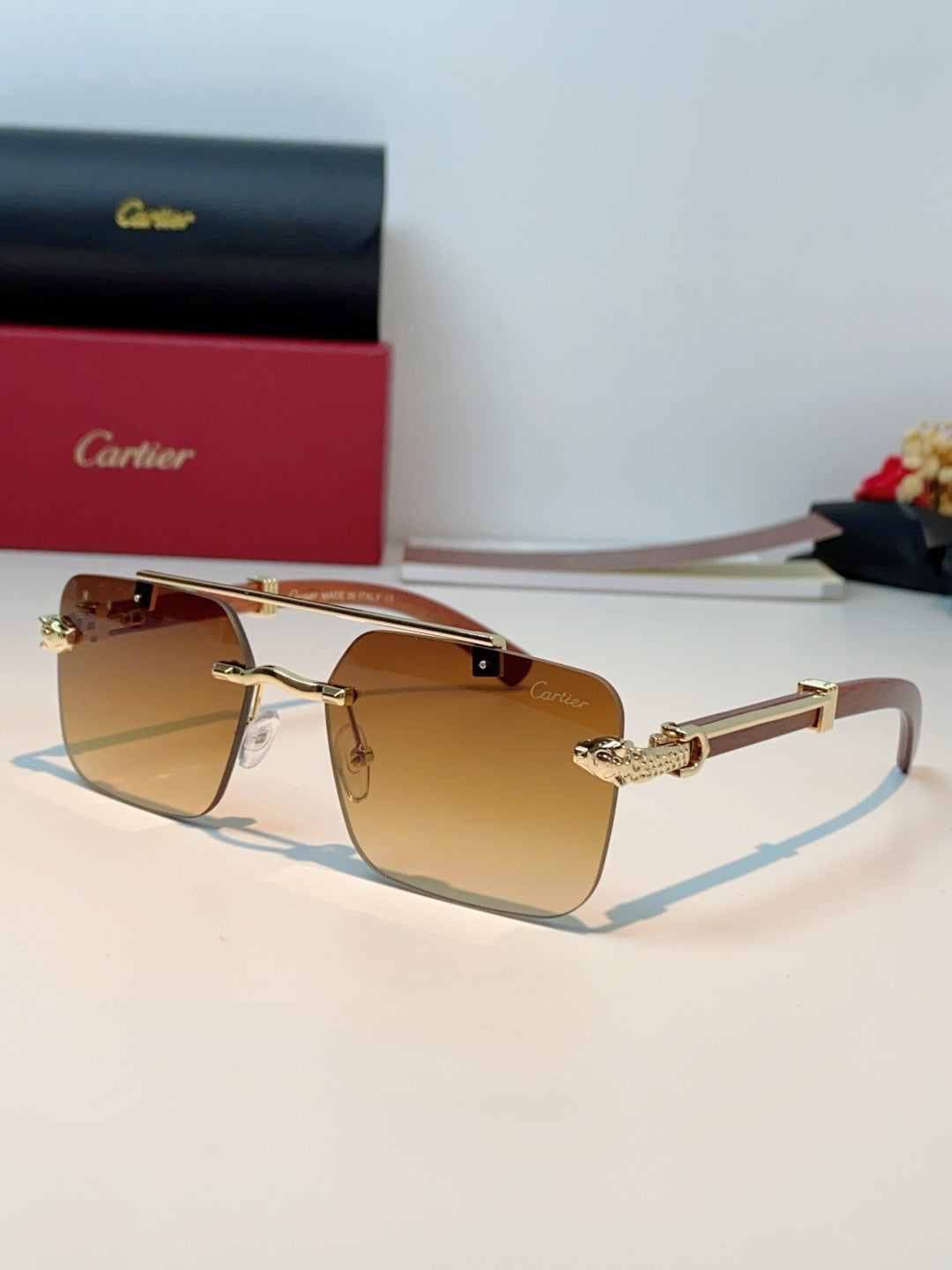 Cartier Lightweight Rimless Orange Lens Sunglasses for Men & Women - 487316