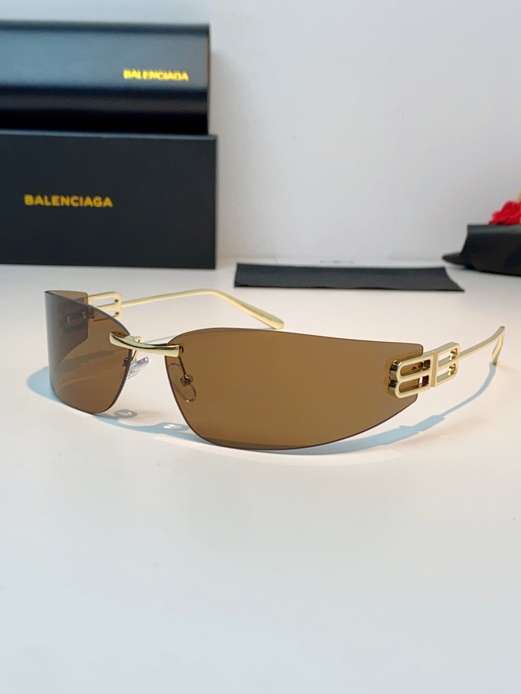Balenciaga Lightweight Rimless Brown Lens Sunglasses for Men & Women - 399136