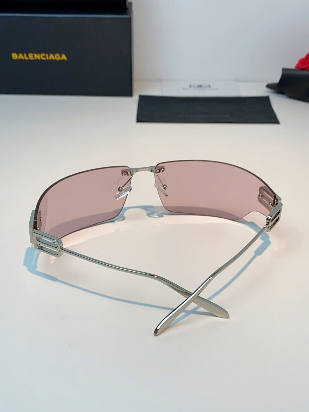 Balenciaga Lightweight Rimless Pink Lens Sunglasses for Men & Women - detail image 3