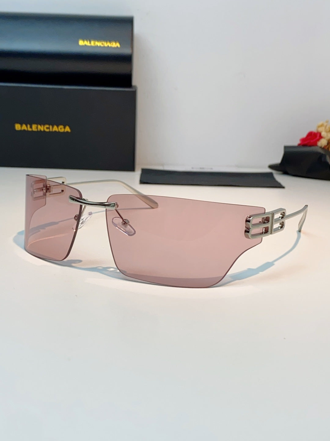Balenciaga Lightweight Rimless Pink Lens Sunglasses for Men & Women