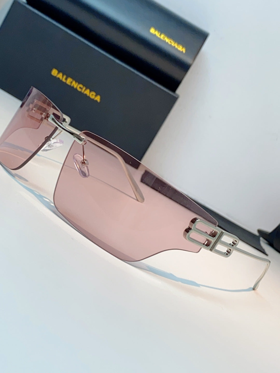 Balenciaga Lightweight Rimless Pink Lens Sunglasses for Men & Women - detail image 7
