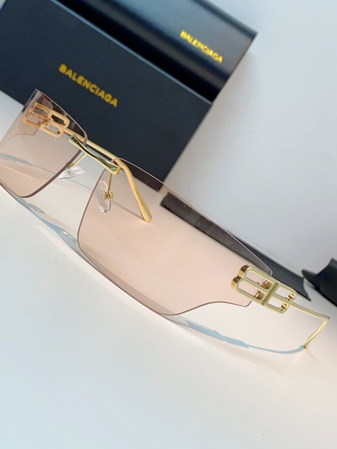 Balenciaga Lightweight Rimless Gold Lens Sunglasses for Men & Women - detail image 7