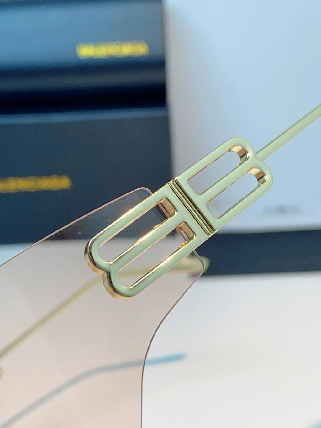 Balenciaga Lightweight Rimless Gold Lens Sunglasses for Men & Women - detail image 8