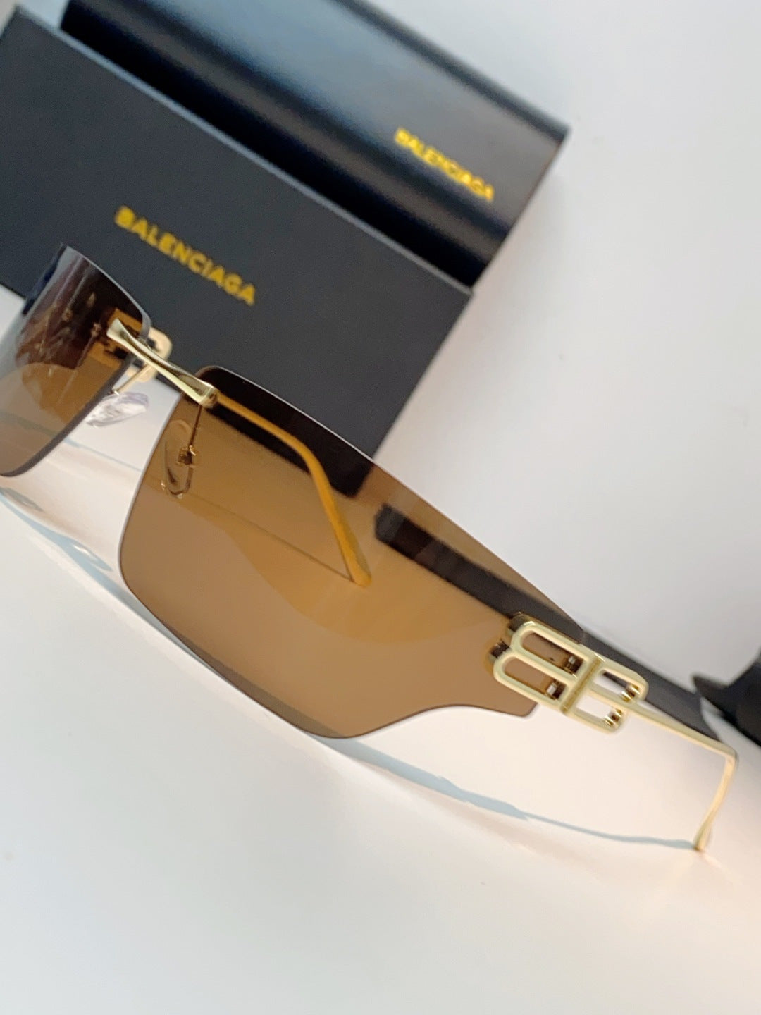 Balenciaga Lightweight Rimless Brown Lens Sunglasses for Men & Women - detail image 7