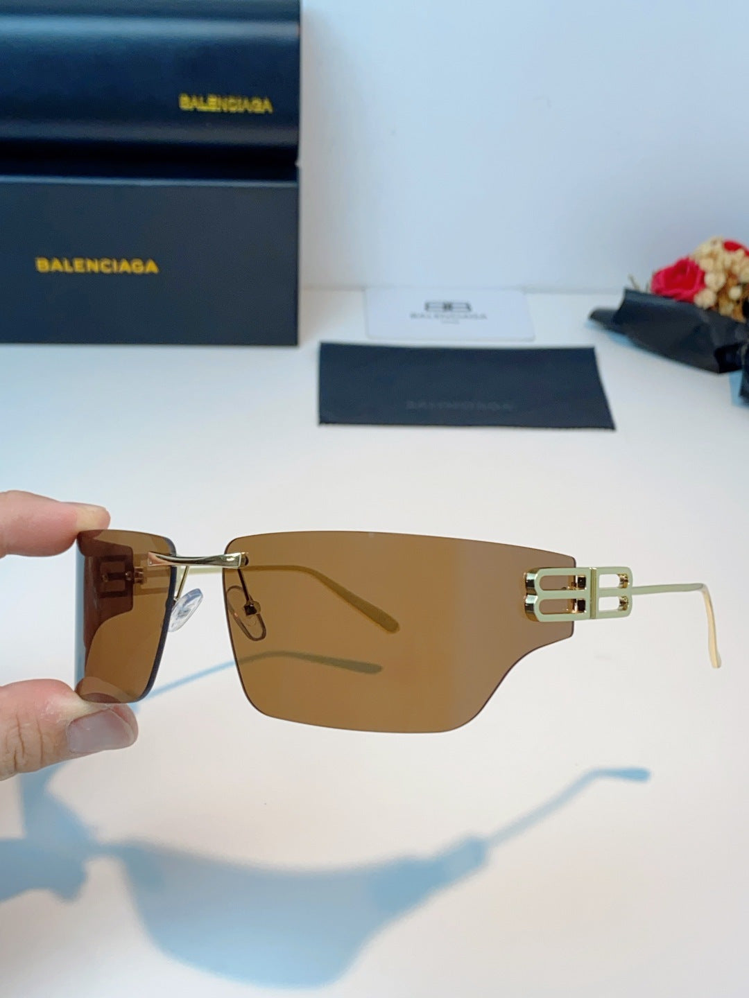 Balenciaga Lightweight Rimless Brown Lens Sunglasses for Men & Women - detail image 6