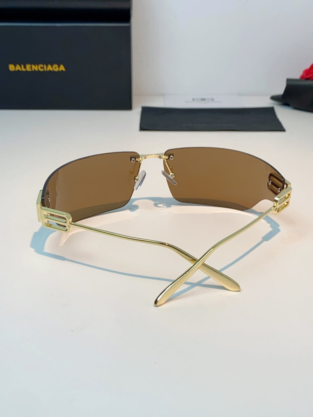 Balenciaga Lightweight Rimless Brown Lens Sunglasses for Men & Women - detail image 3