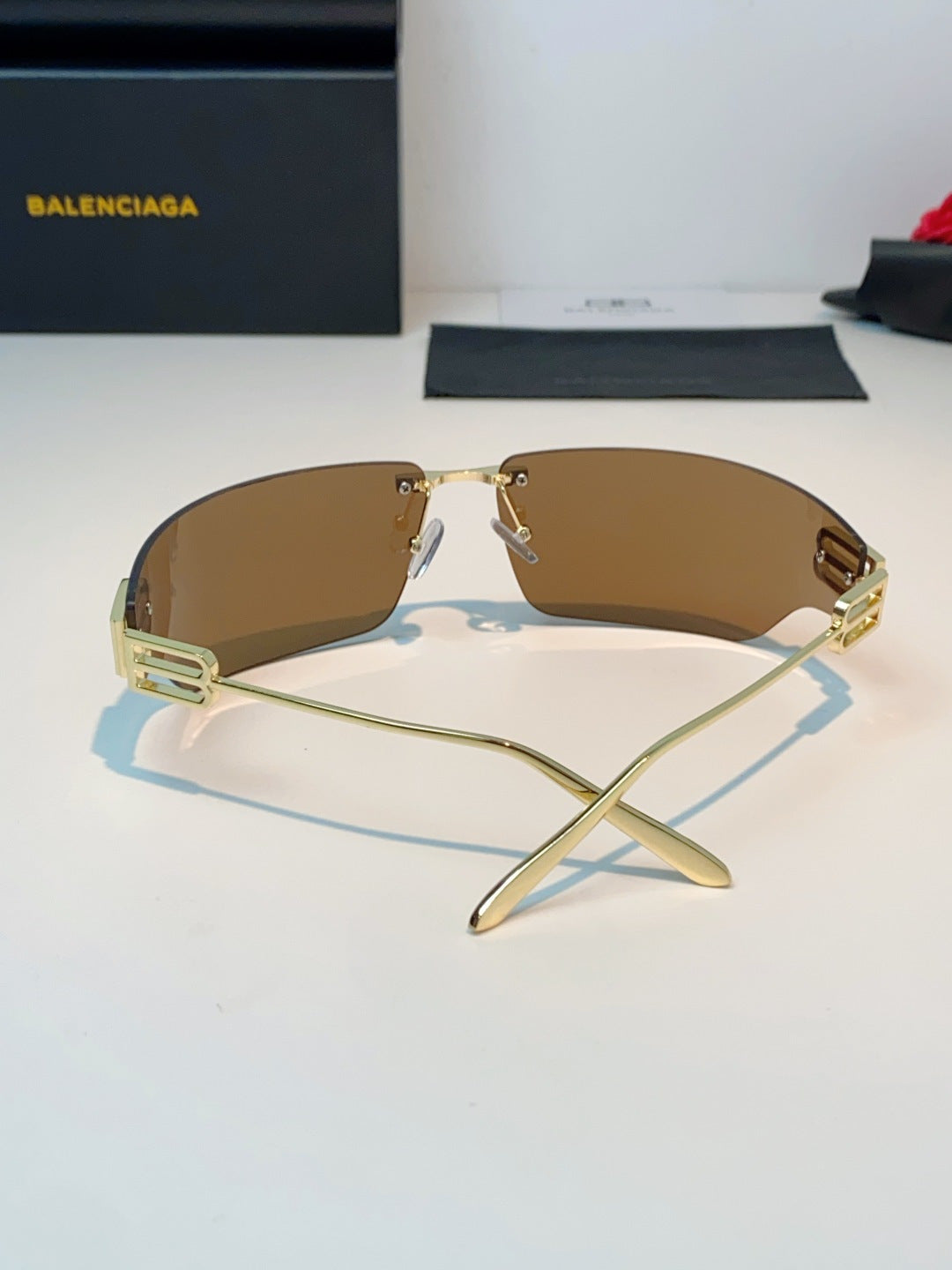Balenciaga Lightweight Rimless Brown Lens Sunglasses for Men & Women - detail image 3