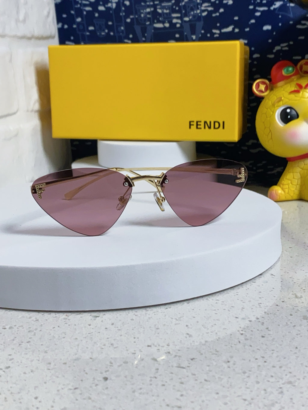 Fendi Lightweight Rimless Purple Lens Sunglasses for Women - detail image 2