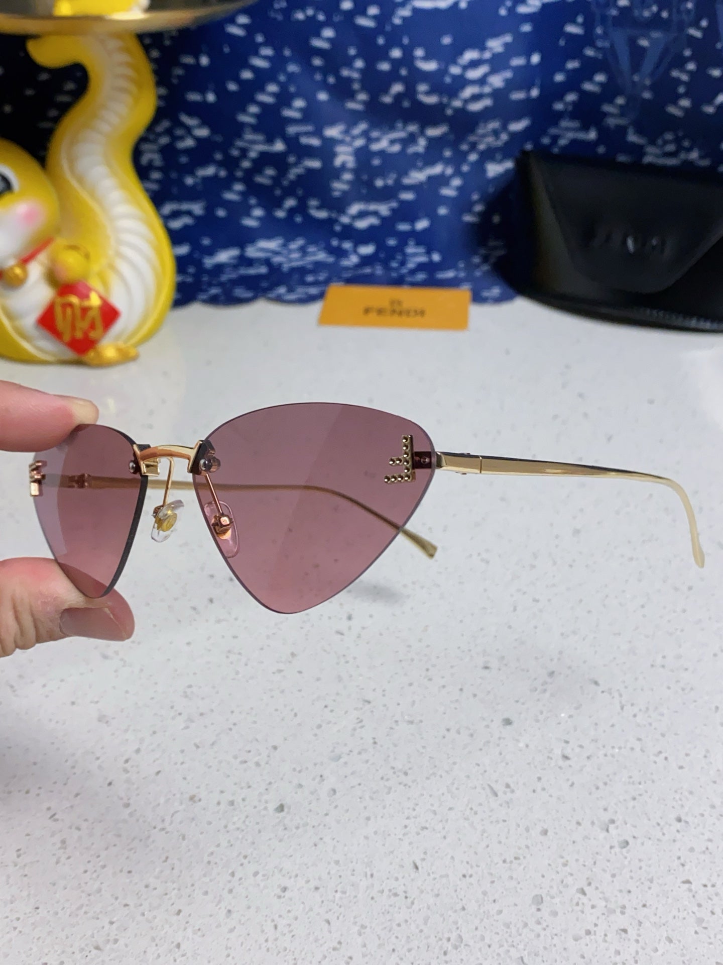 Fendi Lightweight Rimless Purple Lens Sunglasses for Women - detail image 6