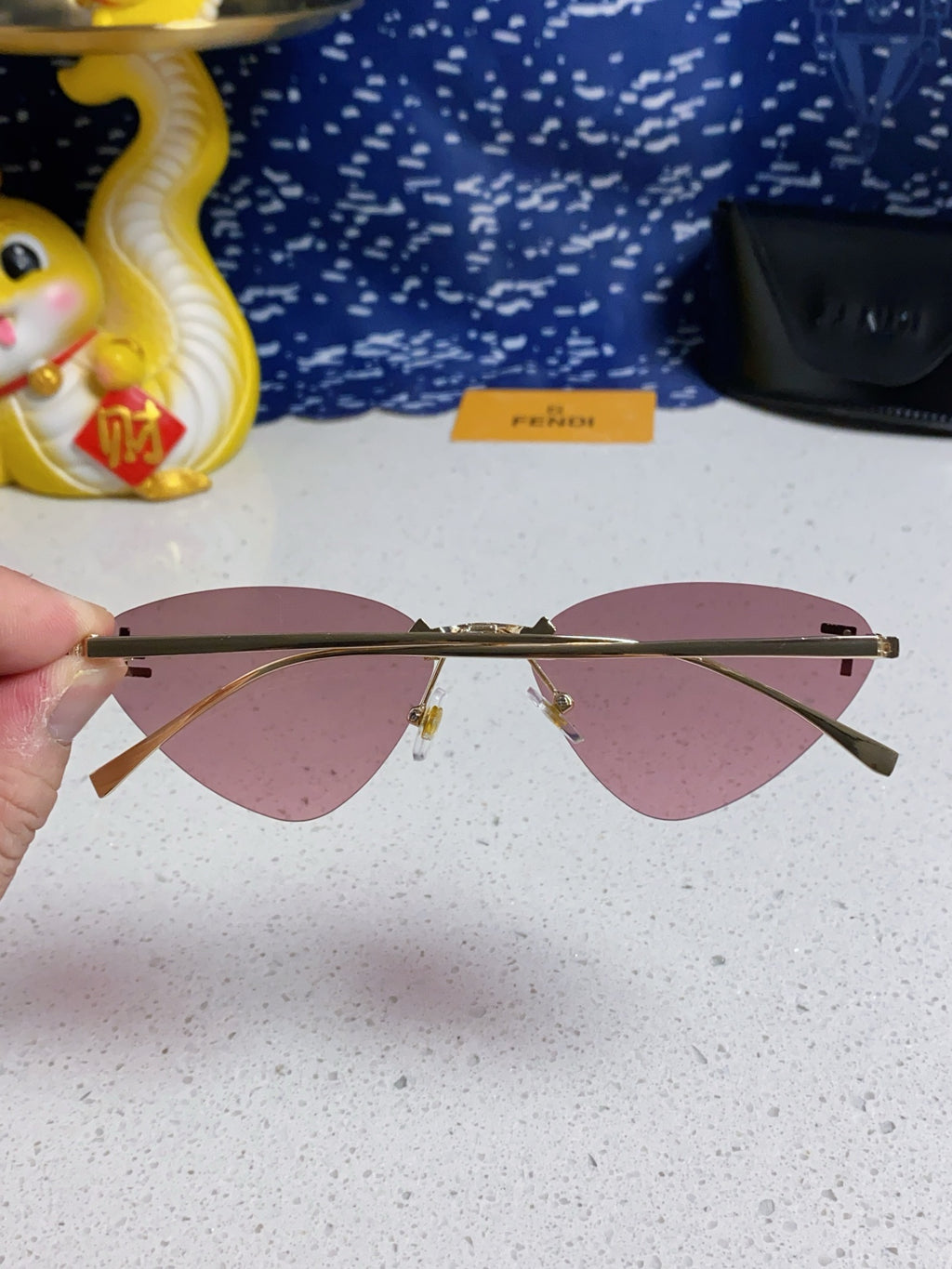 Fendi Lightweight Rimless Purple Lens Sunglasses for Women - detail image 5