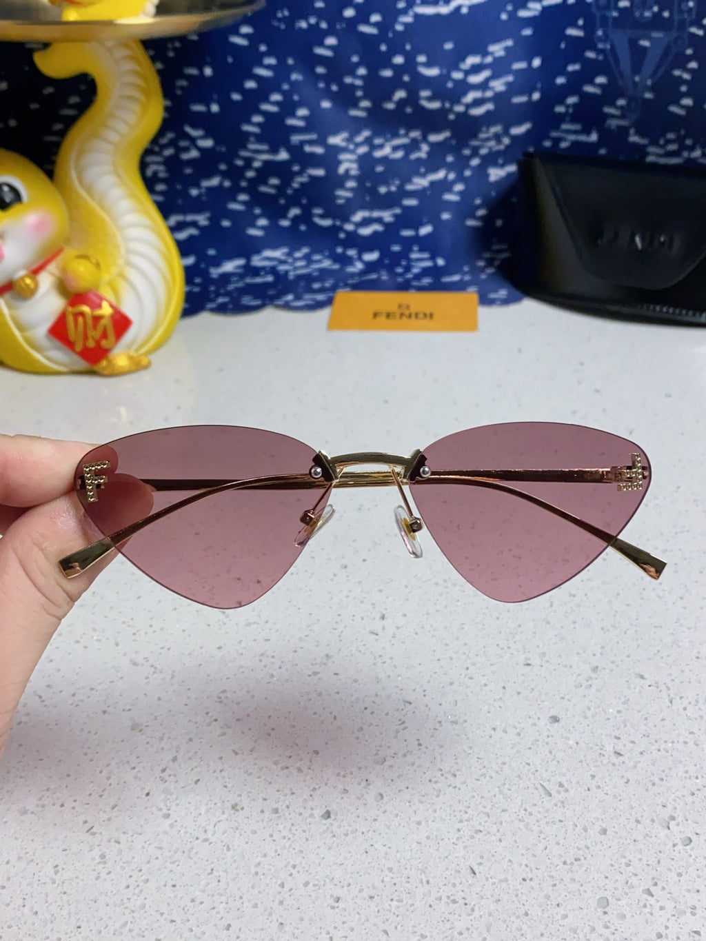 Fendi Lightweight Rimless Purple Lens Sunglasses for Women - detail image 4
