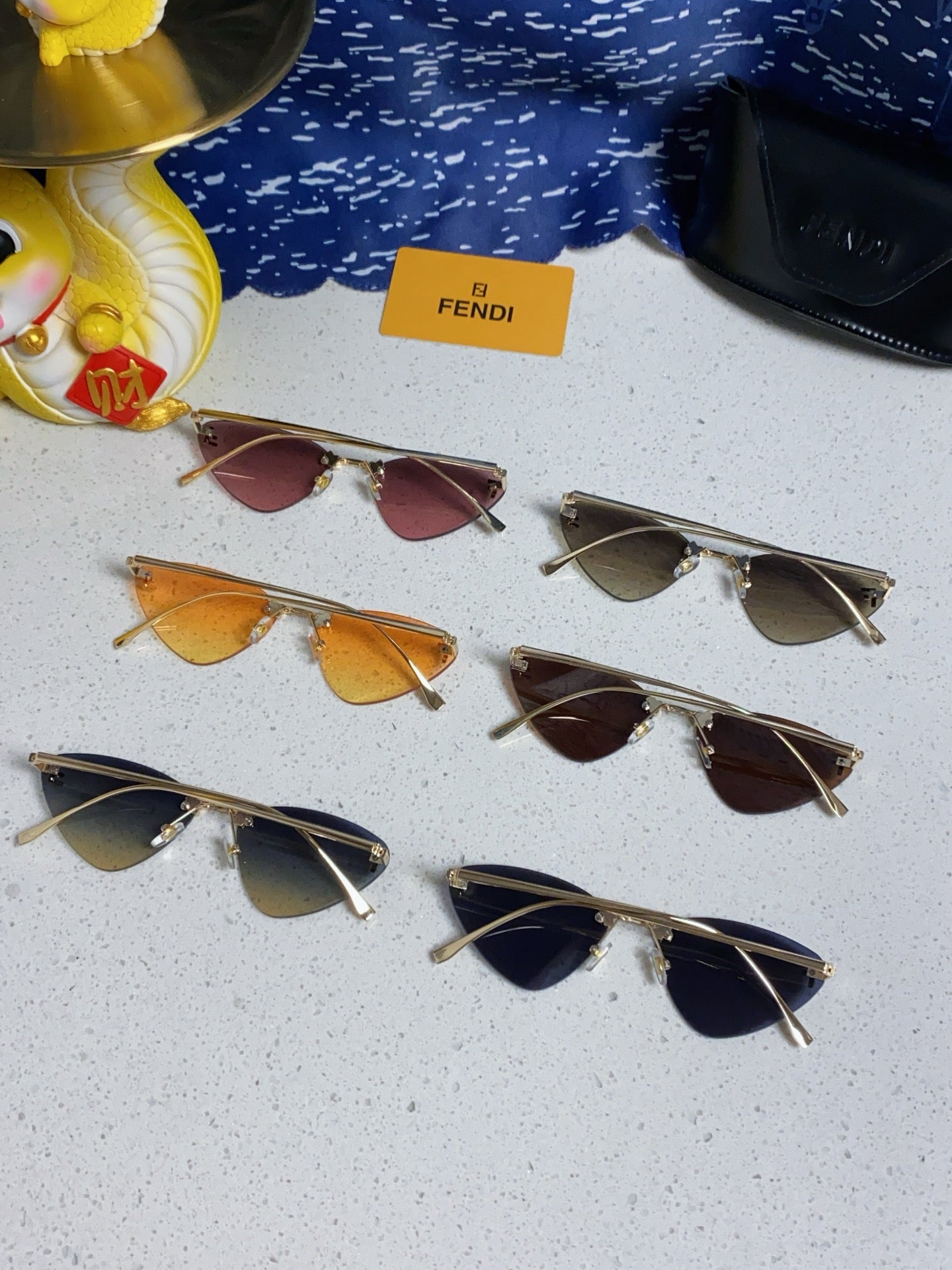 Fendi Lightweight Rimless Gray Lens Sunglasses for Women - detail image 9