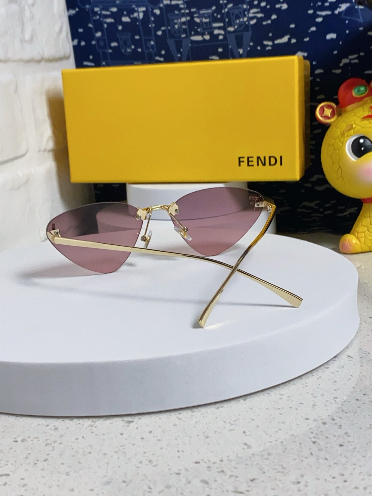 Fendi Lightweight Rimless Purple Lens Sunglasses for Women - detail image 3