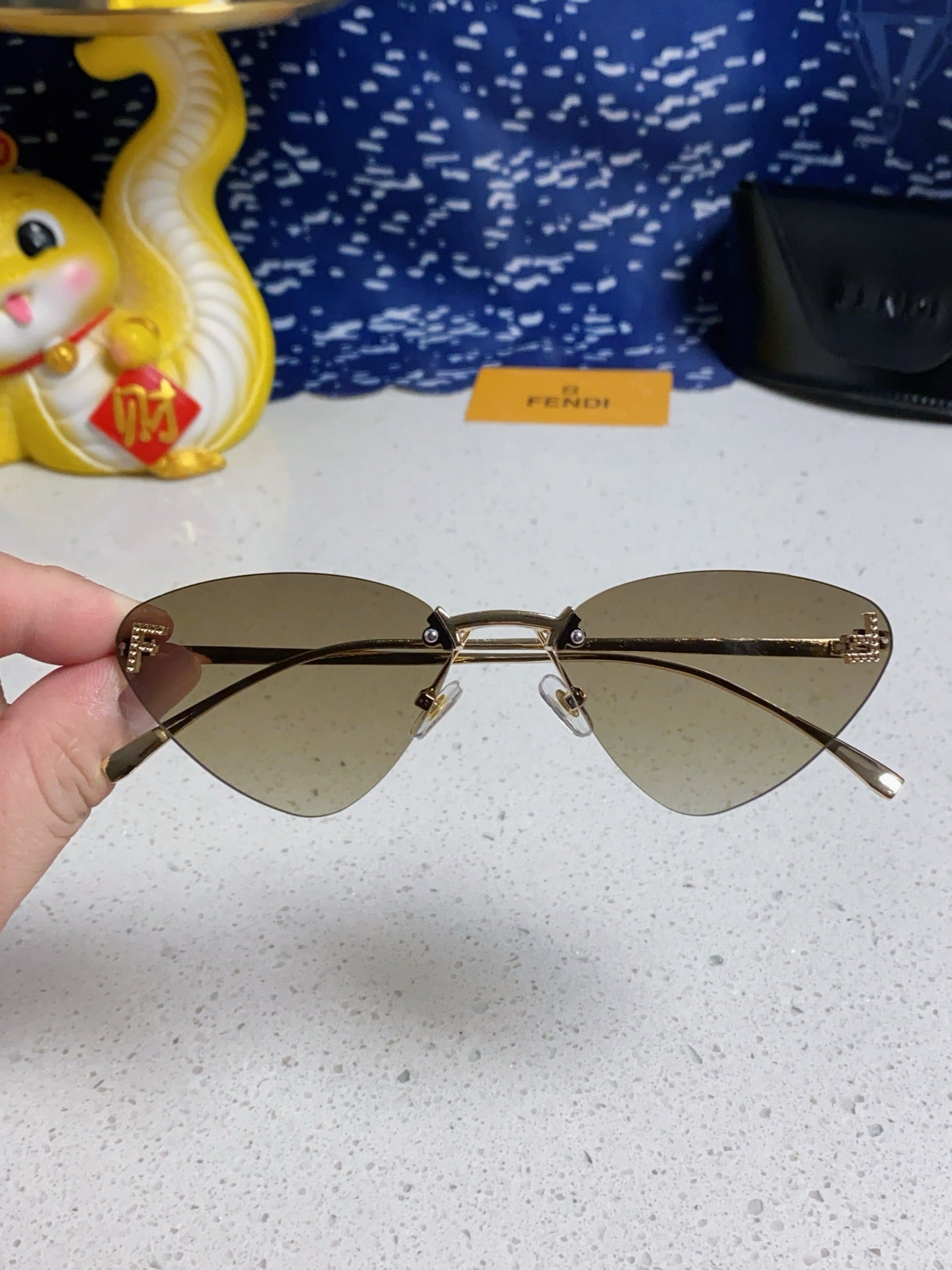 Fendi Lightweight Rimless Gray Lens Sunglasses for Women - detail image 4