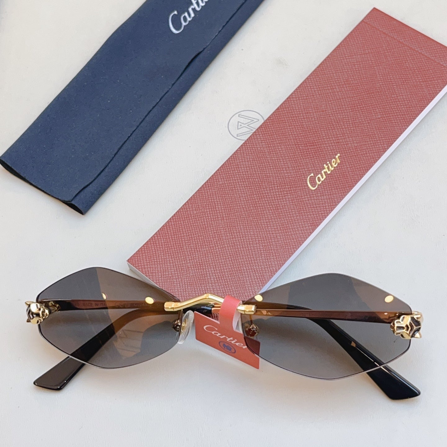 Cartier CT0433S Fashion Red Lens Sunglasses for Men & Women - 415939