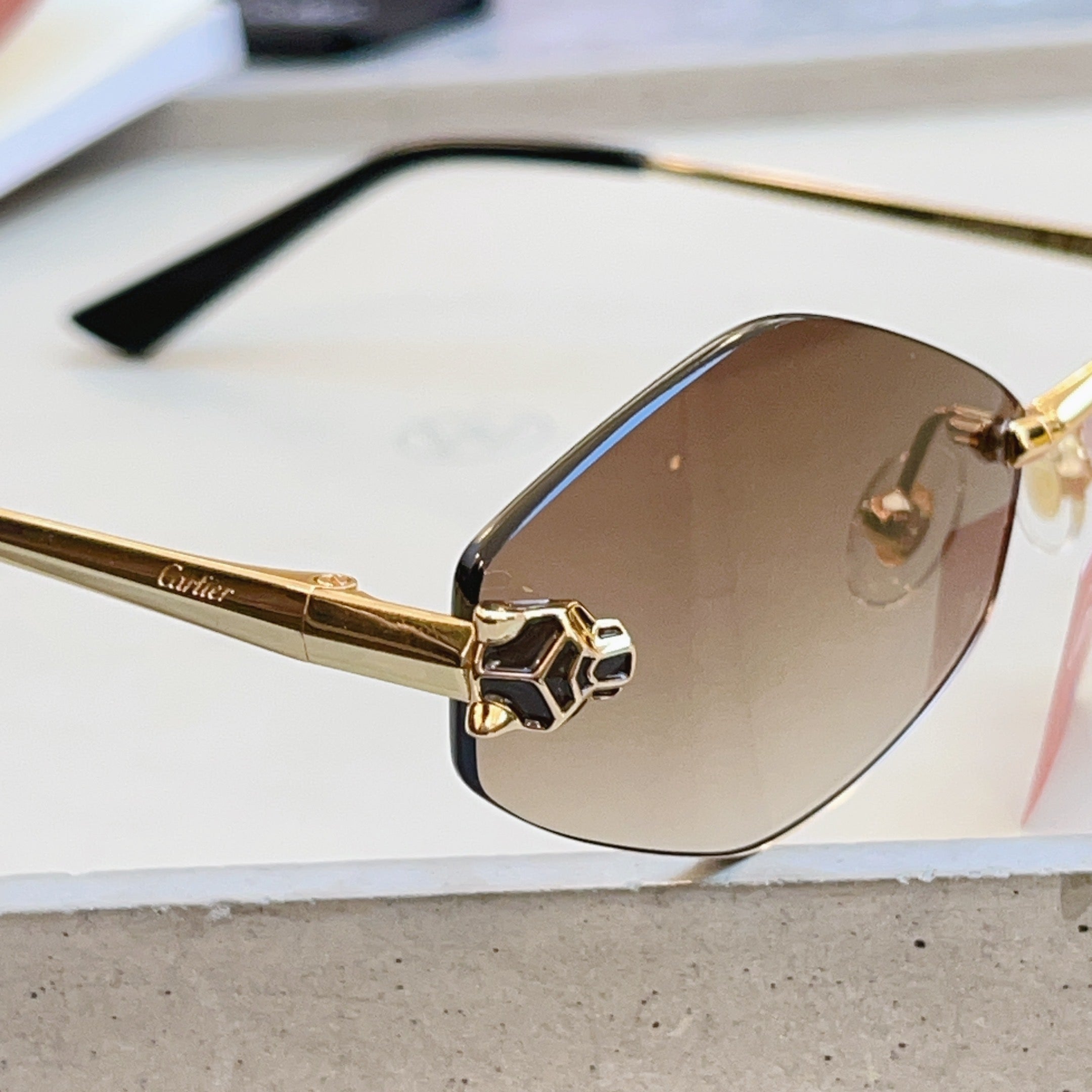 Cartier CT0433S Fashion Red Lens Sunglasses for Men & Women - detail image 4